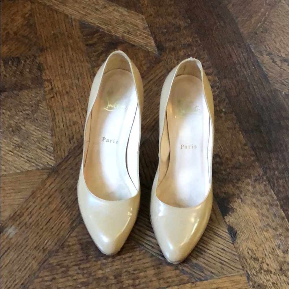 Christian Louboutin tan pumps